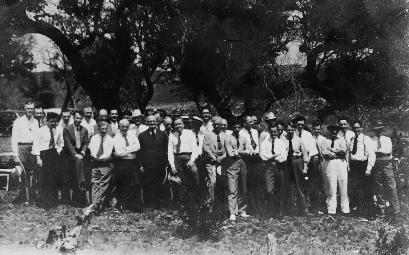 UT PGE faculty and students pose for a photo at an American Institute of Mining, Metallurgical, and Petroleum Engineers (AIME) field trip in Texas, 1936.