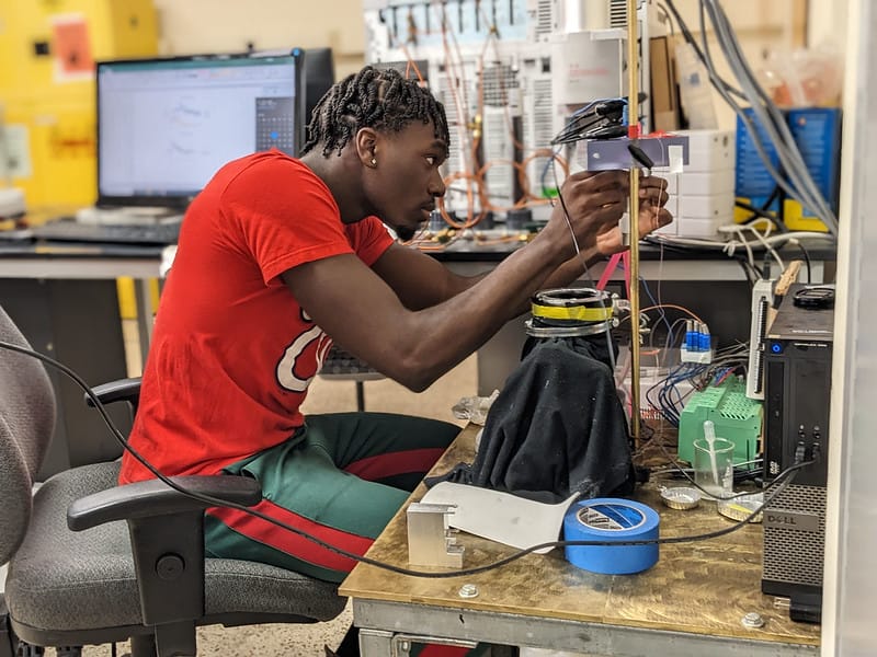 SURI student conducting research in a lab