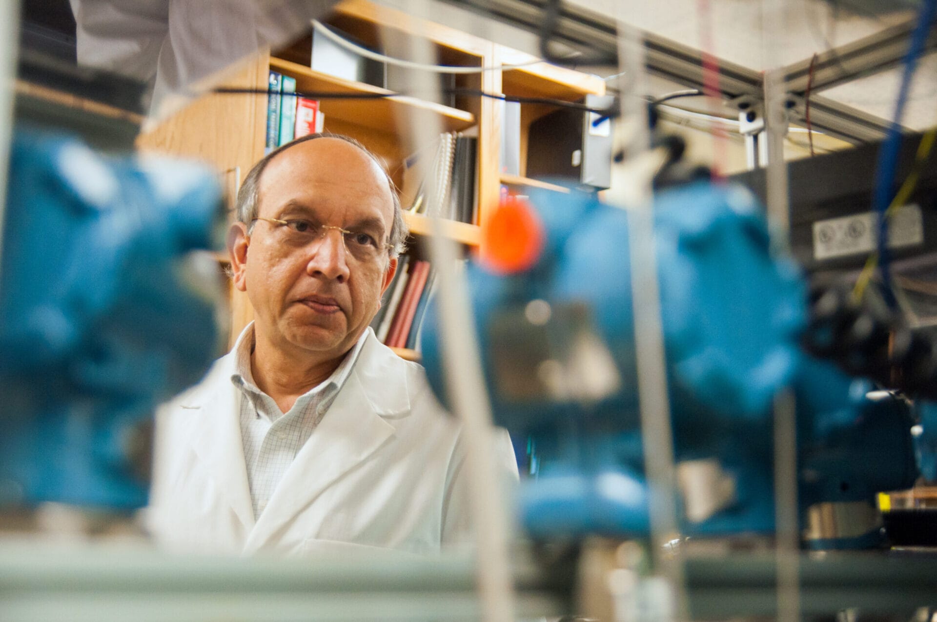 Man in Sharma Lab wearing lab coat