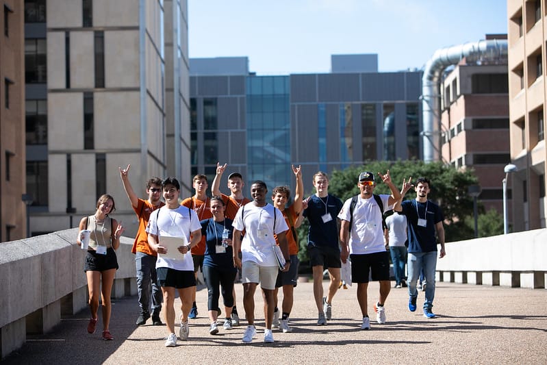 Students with hook em hands