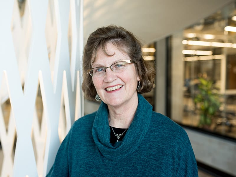 Hilary Olson smiling in EER buidling.