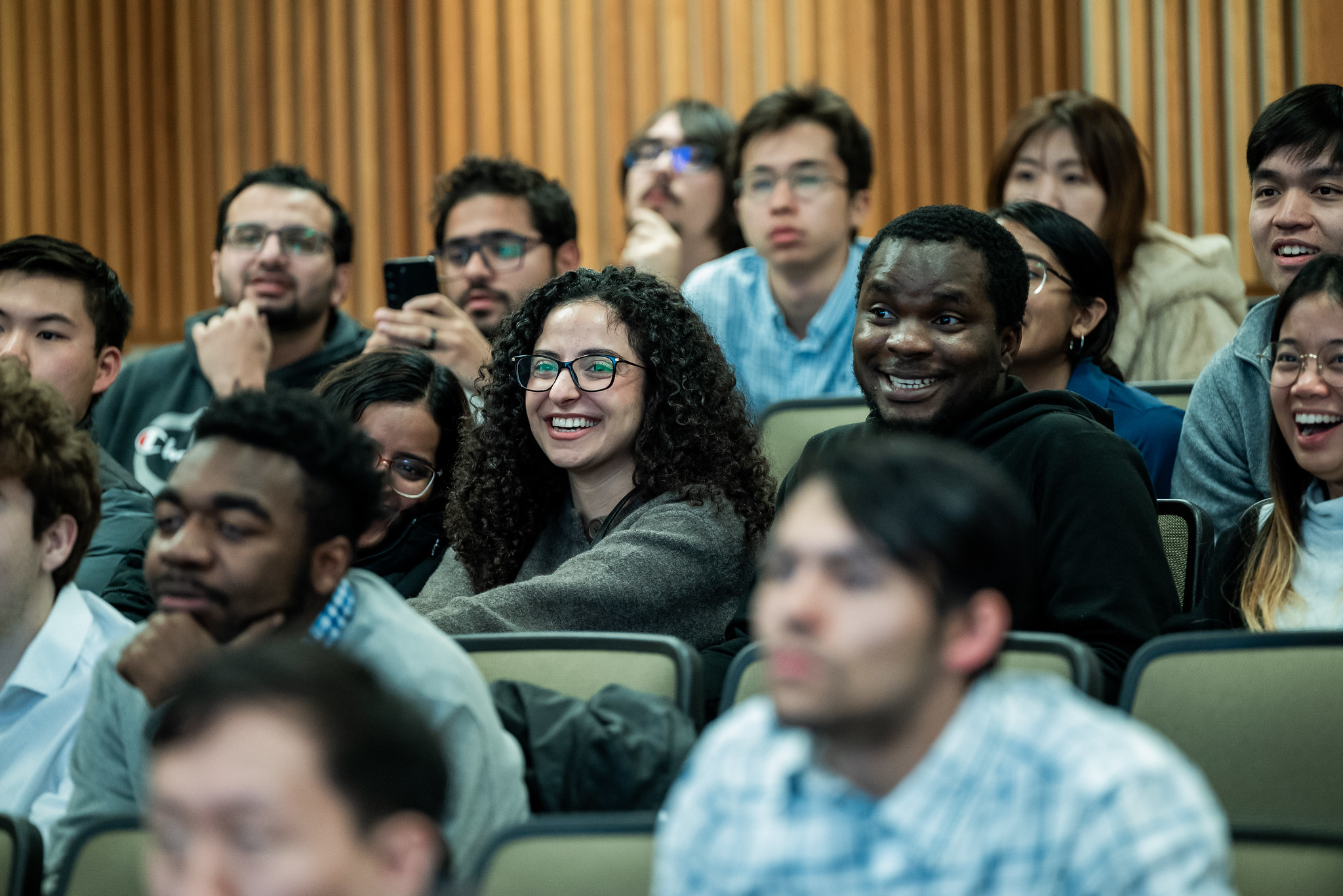 PGE students laughing in classroom.