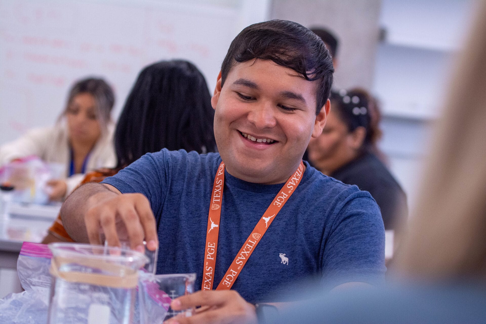 A Texas STEM teacher conducts an energy experiment on the UT campus.